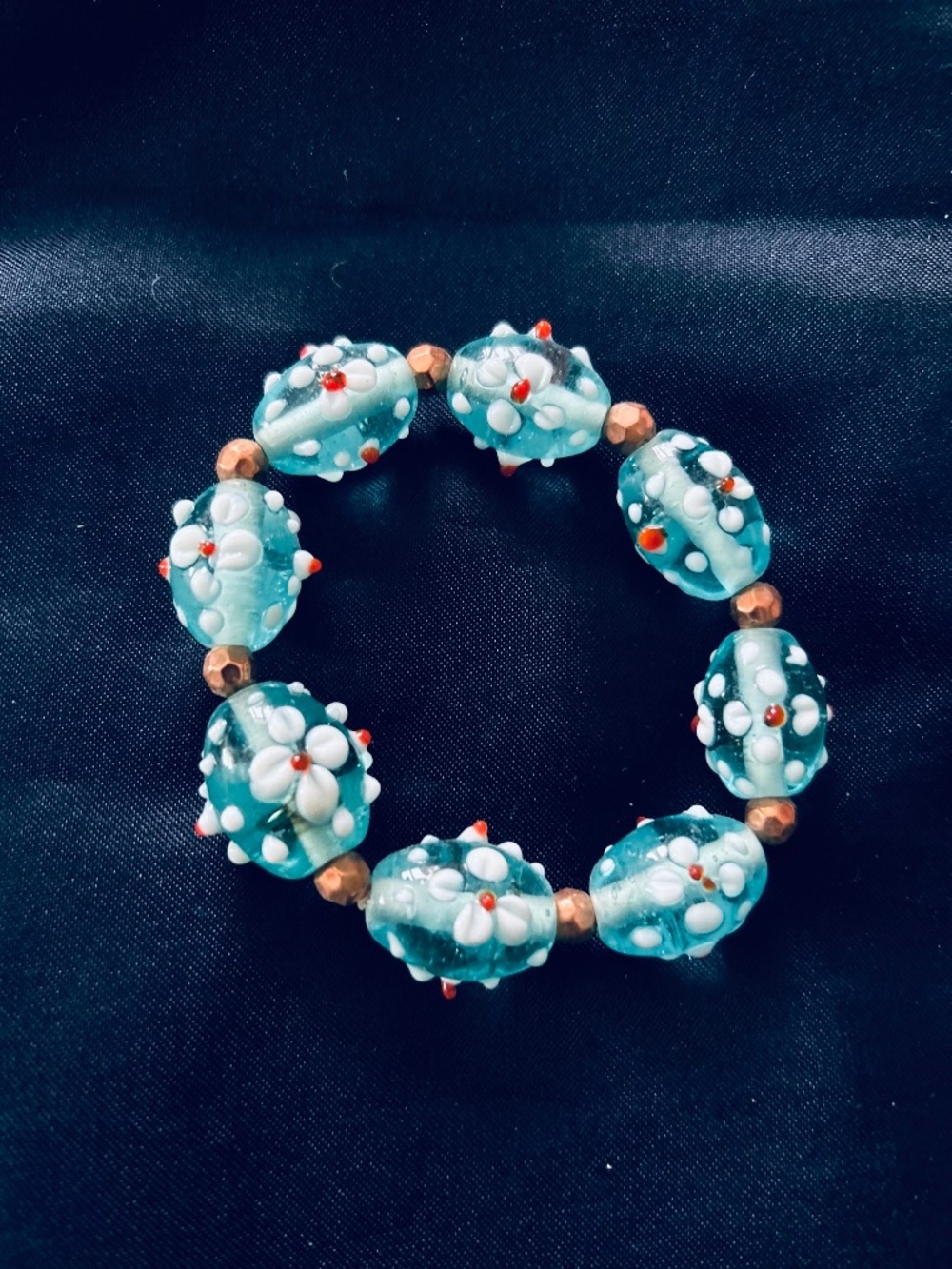 BRACELETS, TWO, GLASS, STRETCHY, MULTICOLOURED BLUE & MULTI GREEN FLOWER DESIGN,